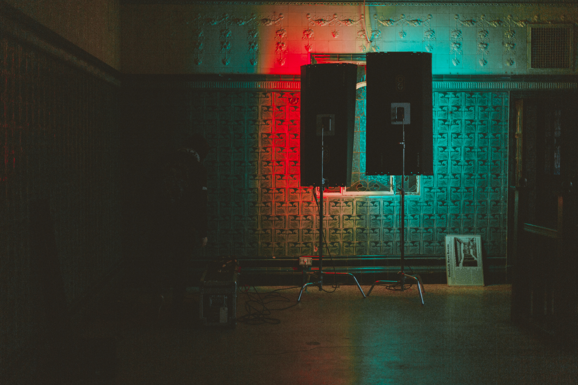 Stage lit in red and teal